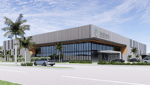 Photo of the exterior of an Intricon building with the logo on the side, in Costa Rica